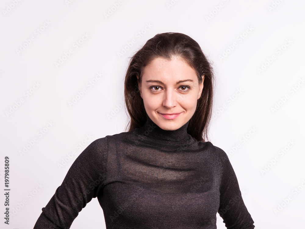 Portrait of a young woman in studio. Portrait of a young woman in studio.