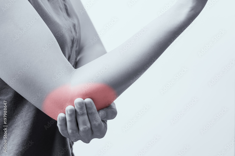 closeup women elbow pain/injury with red highlights on pain area with white backgrounds, healthcare and medical concept - B&W filter