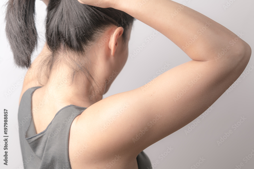 rear view of women tightening the hair, lifestyle concept rear view of women tightening the hair, lifestyle concept