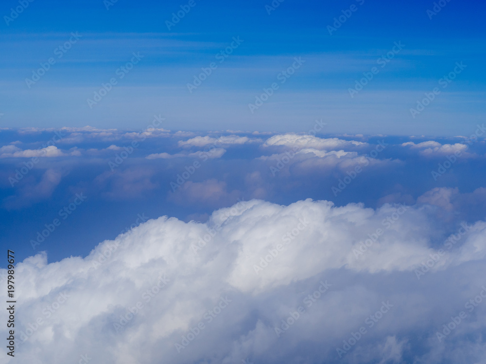 Blue sky clouds seen from airplane beautiful with blue sky background nature. Blue sky clouds seen from airplane beautiful with blue sky background nature.