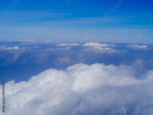 Fototapeta Naklejka Na Ścianę i Meble -  Blue sky clouds seen from airplane beautiful with blue sky background nature.