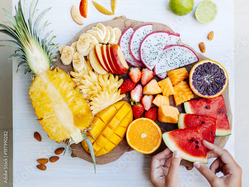 Colorful tropical fruits on serving tray