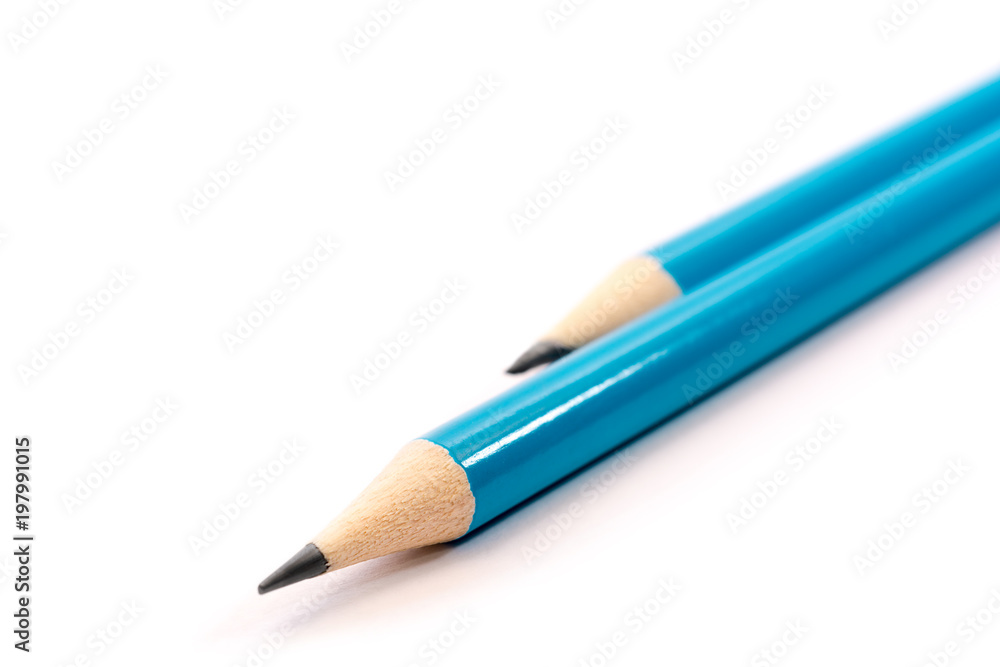 Two blue Pencils on white background. stationery. Office tool. Back to school. Two blue Pencils on white background. stationery. Office tool. Back to school.