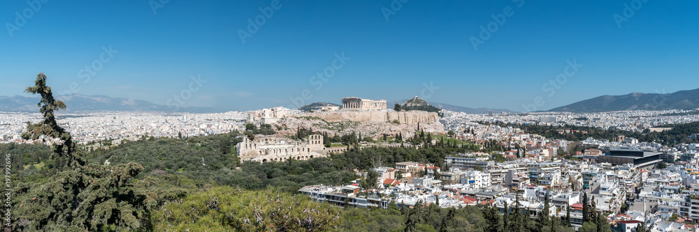 Panoramic view of the Acropolis of Athens against blue sky, Greece.
