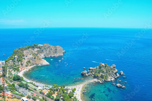 Panoramic view of Isola Bella bay, with its little island at the centre near Taormina, Sicily,Italy.The Pearl of the Ionian Sea