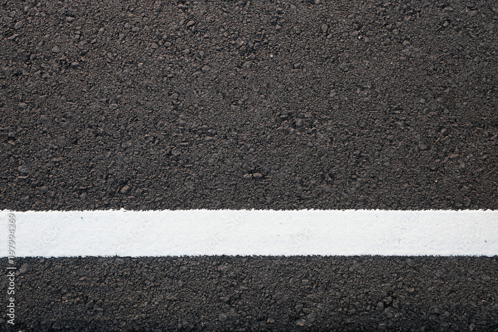 Fototapeta premium Asphalt road texture with white line
