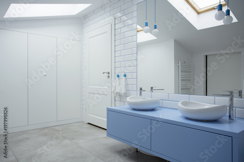 White and blue bathroom interior