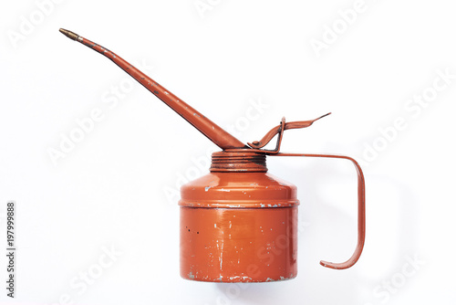 Vintage orange oil can can on a white background
