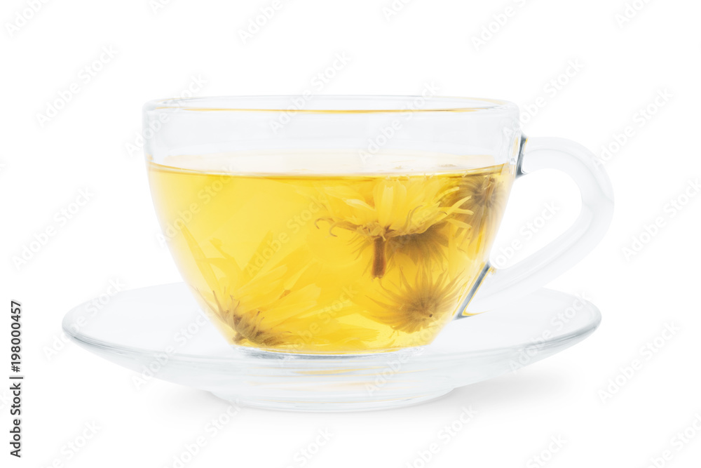 A phyto tea in a transparent cup on a white background A phyto tea in a transparent cup on a white background