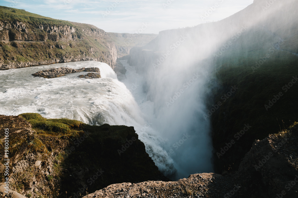 magnificent icelandic landscape with scenic powerful Gullfoss waterfall at sunlight
