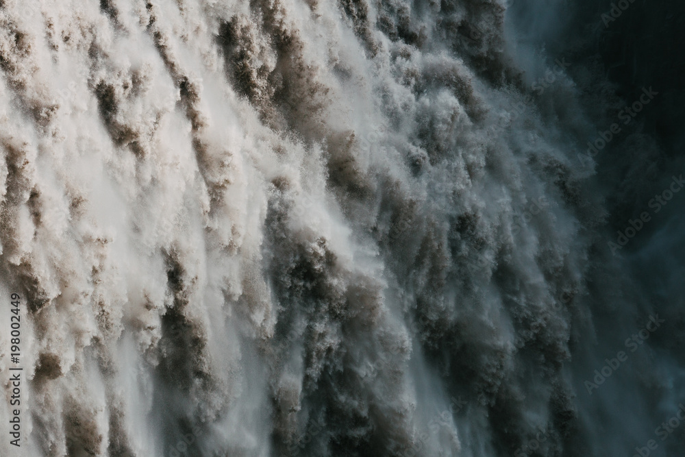 Fototapeta premium full frame of falling water in majestic powerful Dettifoss waterfall, iceland