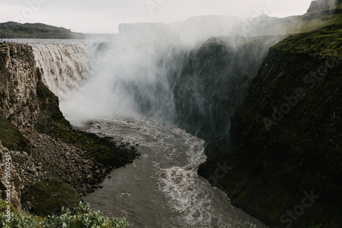 beautiful landscape with scenic Dettifoss waterfall and rocks in iceland