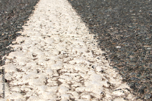 asphalt with white line close-up
