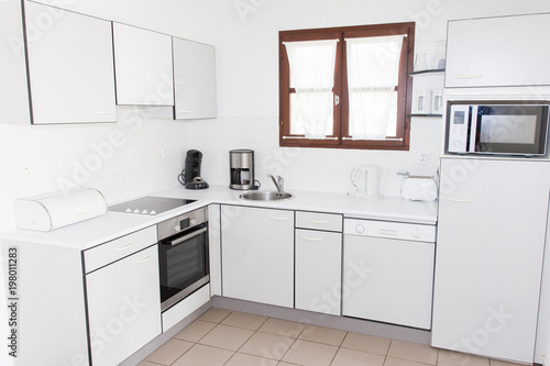 real Bright modern kitchen with stainless steel appliances Interior design