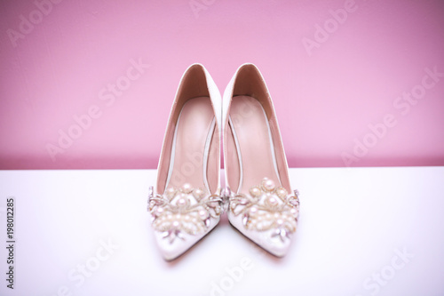 Elegant and stylish bridal shoes. Selective focus.