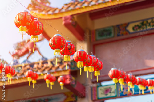 Beautiful Chinese red lantern decoration for Chinese New Year Festival at Chinese shrine, the Chinese alphabet Blessings written on it. © Thinapob