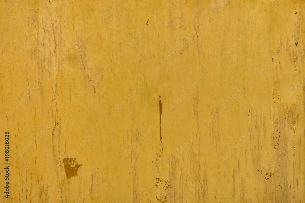 Yellow painted metal surface as background or texture. Old metal background. Painted metal texture Yellow painted metal surface as background or texture. Old metal background. Painted metal texture