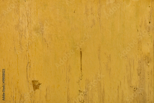 Yellow painted metal surface as background or texture. Old metal background. Painted metal texture