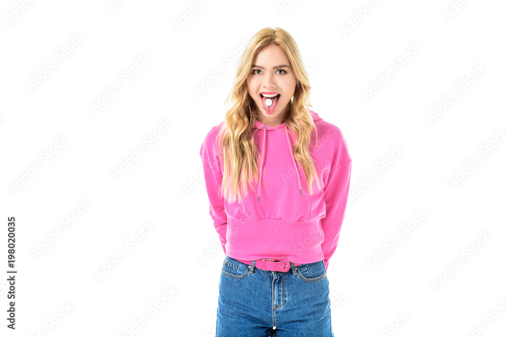 Blonde woman holding pill on her tongue isolated on white Blonde woman holding pill on her tongue isolated on white