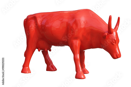Foto Sculpture of a red cow on an isolated background
