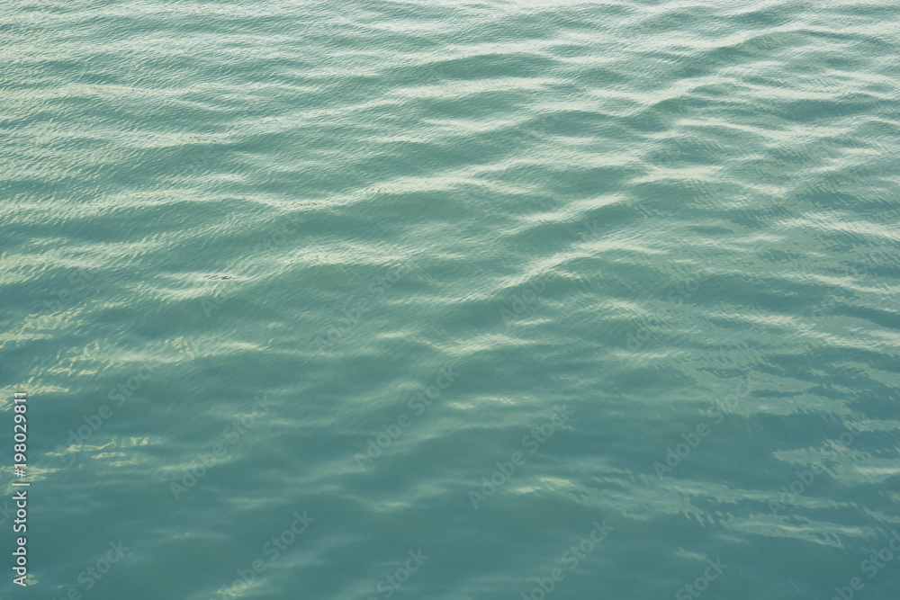 Blue water surface, abstract background with texture and pattern Blue water surface, abstract background with texture and pattern