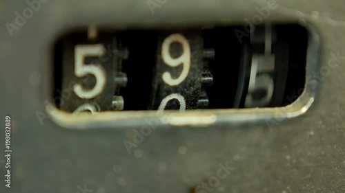 Old Counter of the audio cassette in the tape deck recorder is rotating quickly.