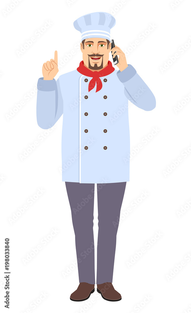 Chef pointing up and talking on the mobile phone Chef pointing up and talking on the mobile phone