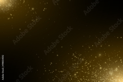 Abstract golden lights. Flying magical golden dust and glares. Festive Christmas background. Light effect. Golden Spray. Vector illustration