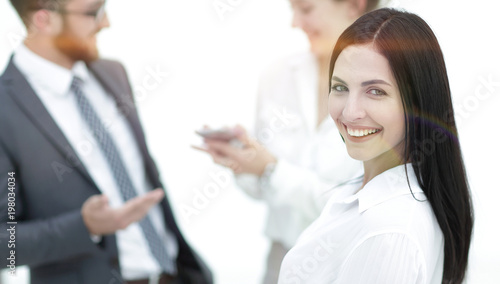 close-up of a beautiful woman manager and co-workers in the office © ASDF