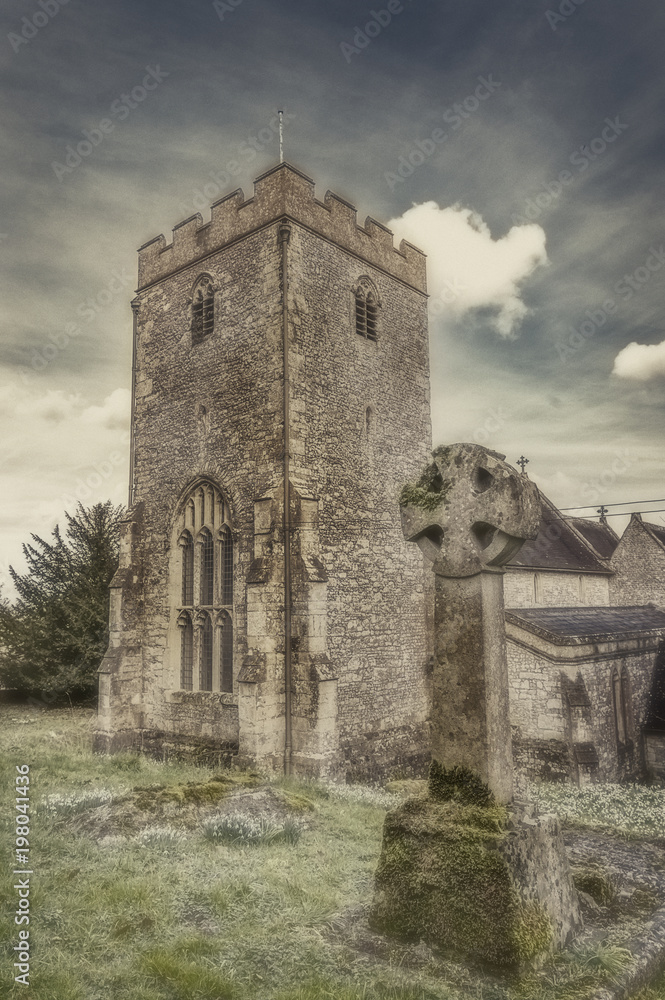 English Village church with a cemetery - Fairytale appearance