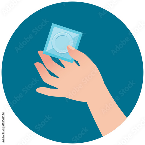 Female hand holding out a condom