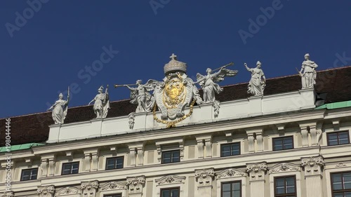 Ornamente am Dach des Reichskanzleitrakts in Wien photo