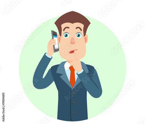 Businessman talking on mobile phone and standing with his finger to his lips