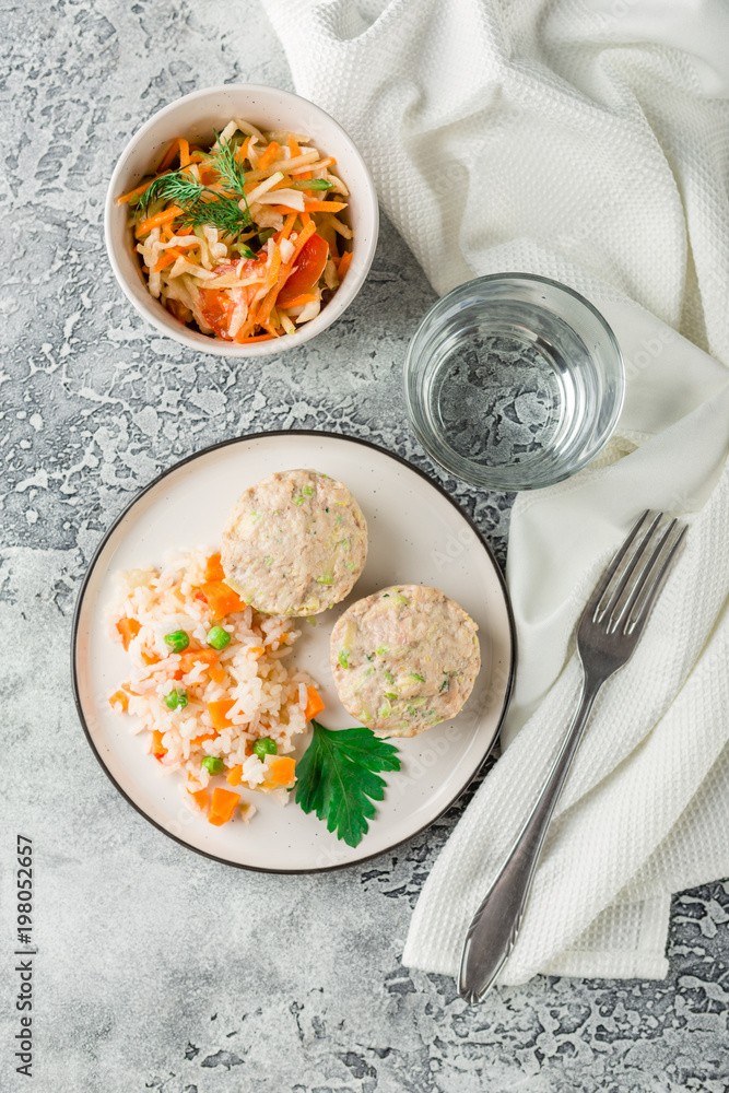 Chicken cutlets steamed with vegetables