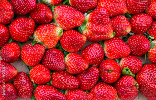 A full box of organic strawberries.