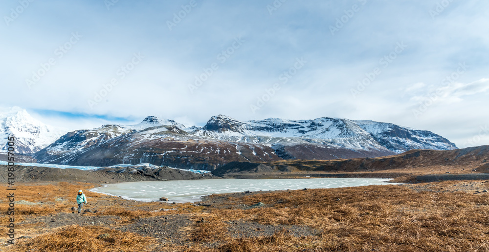 Mountains, valleys, lake and meadow in Iceland