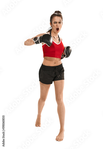 Fit beautiful woman with the boxing gloves isolated on white background
