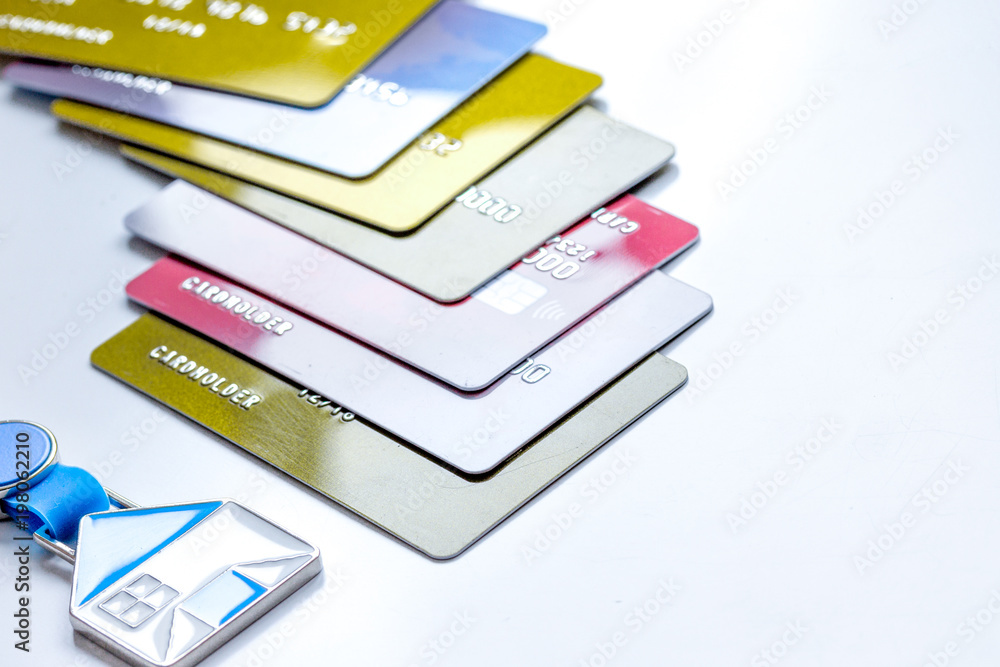 credit cards, key ring - concept mortgage on white background credit cards, key ring - concept mortgage on white background
