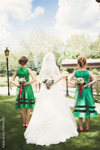 Bride holding big and beautiful wedding bouquet with flowers