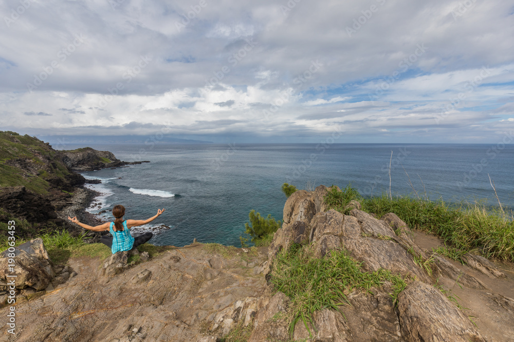 Woman Practicing Yoga on Maui