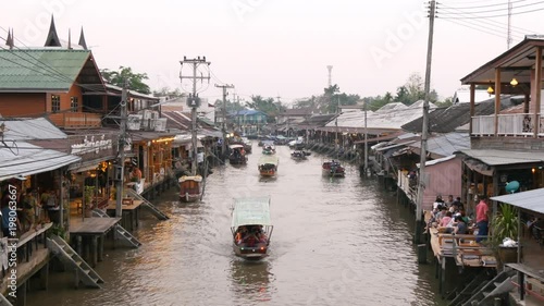 Samut Songkhram, Thailand - March 23 Amphawa floating market in Samut Songkhram, Thailand. It is one of the most popular floating markets in Thailand.