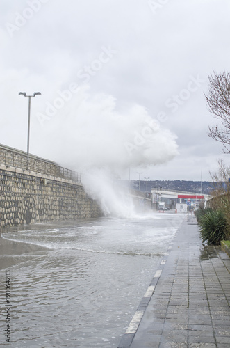 Stormy sea and chashing waves on breakwater, Varna, Black Sea, Bulgaria