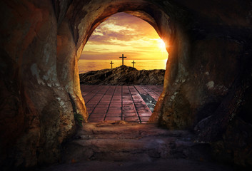 Empty tomb with three crosses