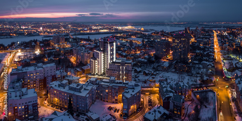 A view of city birds overlooking the street uses a photo of a drone at night, an image of a business concept