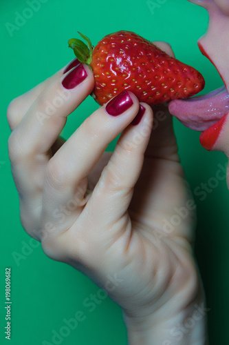 strawberry in the hand