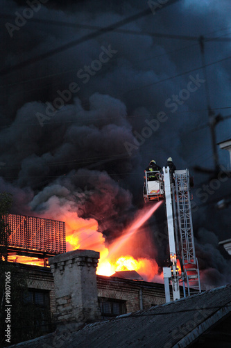 Extinguishing fire from the lift, fire and black smoke..