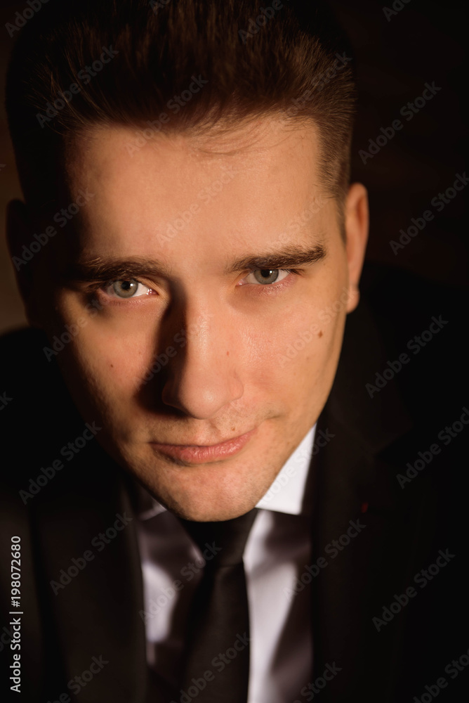 Obraz premium Successful businessman portrait indoor in a modern studio.