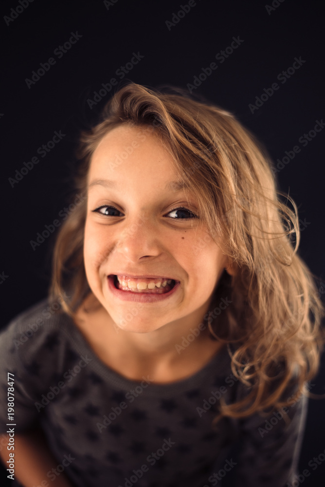 Portrait of happy girl making faces Portrait of happy girl making faces