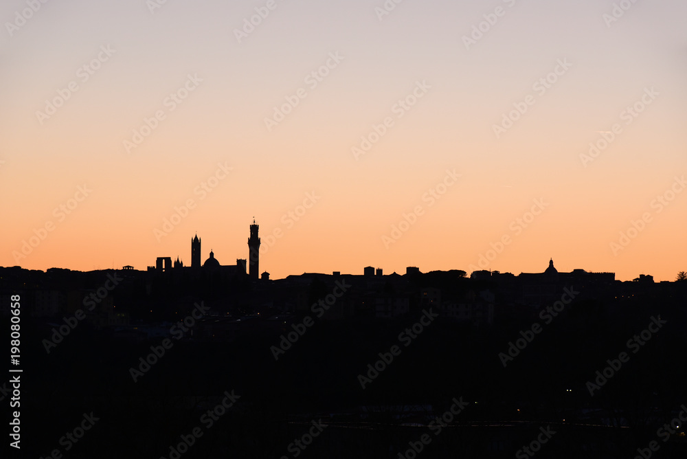 Scenic view of Siena downtown at sunset