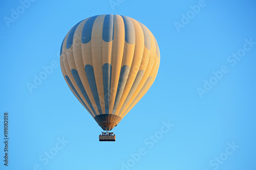 Hot air balloons in the blue sky, active leisure or adventure of a dream concept.